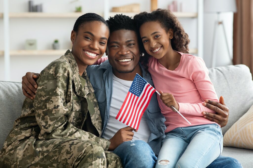 Beautiful black family celebrating reunion at home